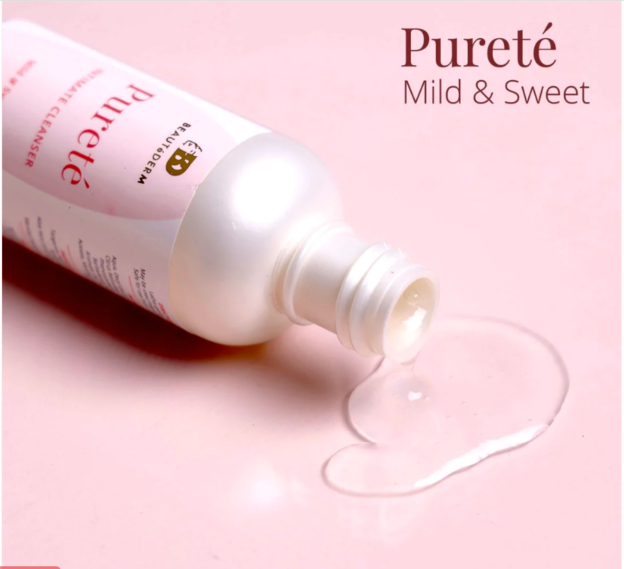 purete mild and sweet intimate wash bottle on the surface showing its liquid by beautederm 